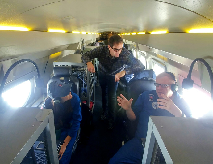 Left to right: Nikki Hathaway (NOAA AOC), David Lavers (ECMWF), and Richard Henning (NOAA AOC) on board the NOAA G-IV research aircraft.